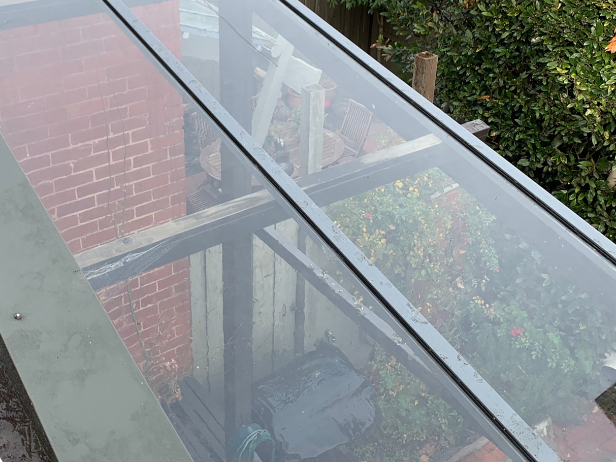 glass pergola roof lichen growth after treatment roof cleaning melbourne